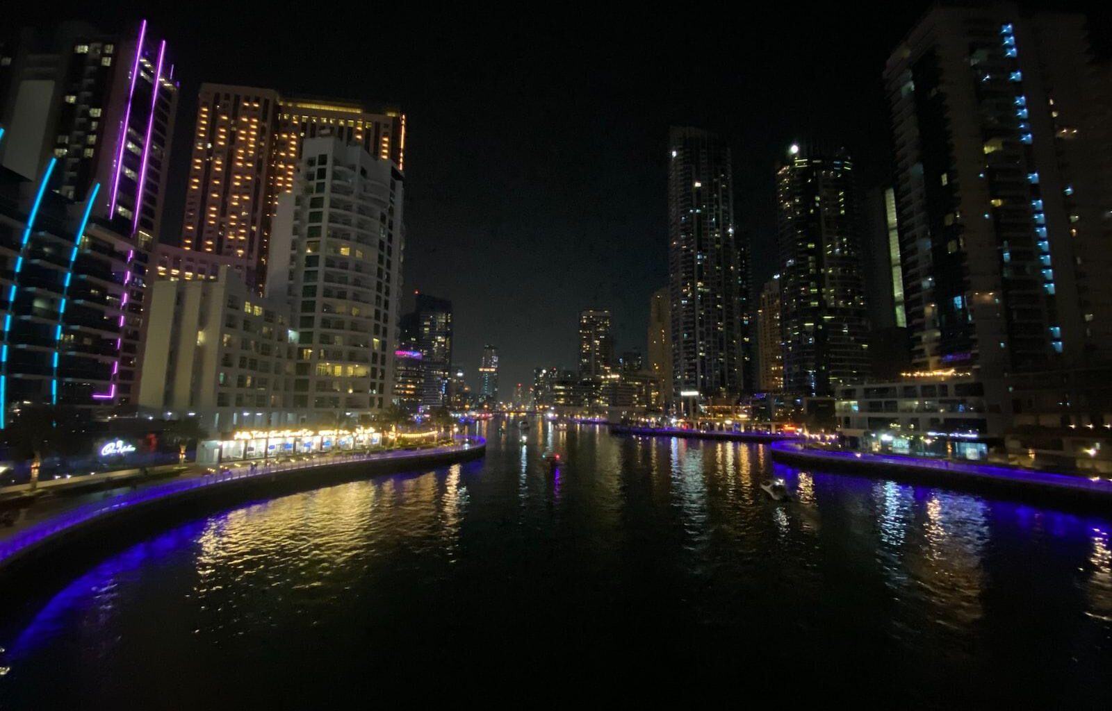 a river running through a city at night