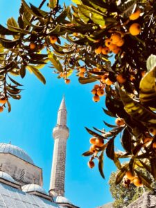 Photo by Adnan Hajvazovic 3 white concrete building under blue sky during daytime