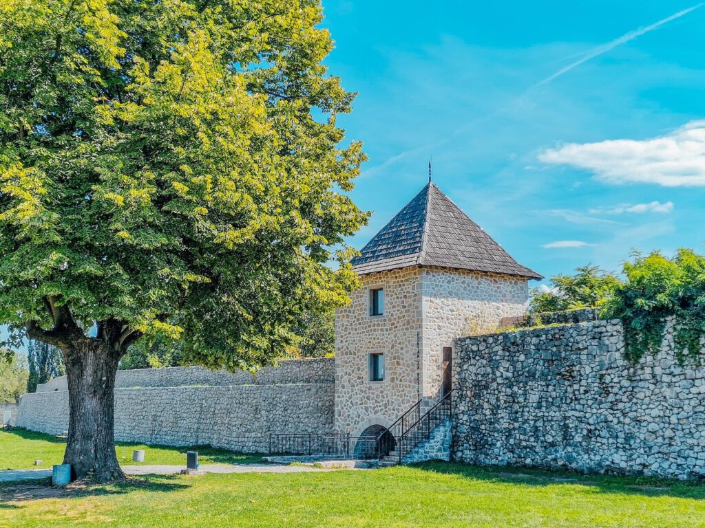 a stone building with a steeple