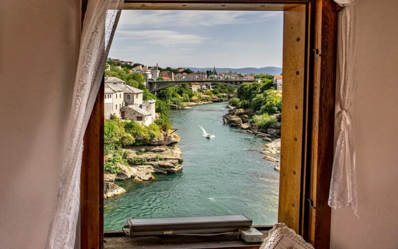 brown wooden framed glass window