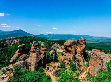 Which Is The Most Underrated Country In Europe To Travel? 3 brown rock formation under blue sky during daytime
