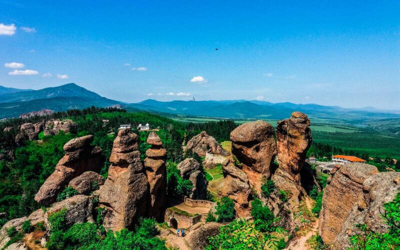 brown rock formation under blue sky during daytime