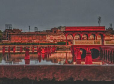 Is Safe To Travel To Lahore Alone 2 red concrete building near body of water during daytime